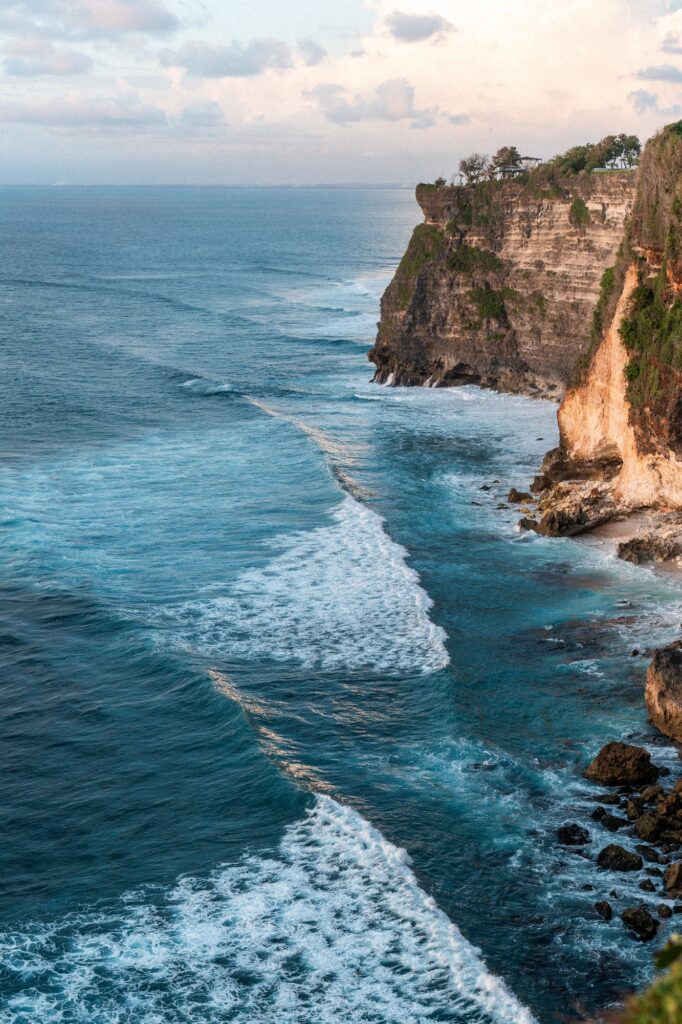 Rocky cliff coastline and ocean, sea, near Uluwatu temple in Bali, Indonesia